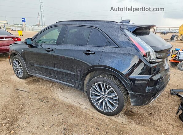1GYFZER4XRF200620 2024 CADILLAC XT4 Black Tył lewy