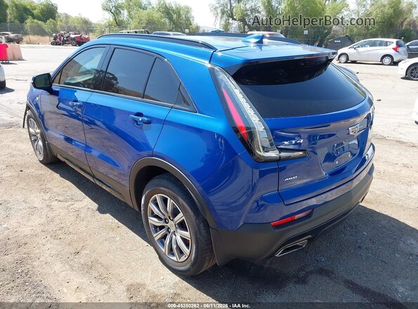 1GYFZFR42MF035595 2021 CADILLAC XT4 Blue Rear left