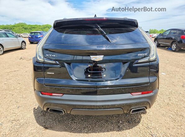 1GYFZFR43KF192470 2019 CADILLAC XT4 Black Вид ззаду
