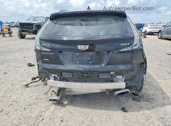 1GYFZFR45KF195290 2019 CADILLAC XT4 Black Вид ззаду