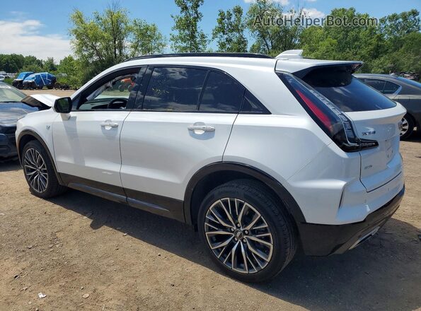 1GYFZFR47RF100299 2024 CADILLAC XT4 White Trasero izquierdo