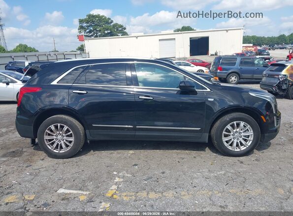 1GYKNARS1KZ107930 2019 CADILLAC XT5 Black Widok wnętrza z tyłu