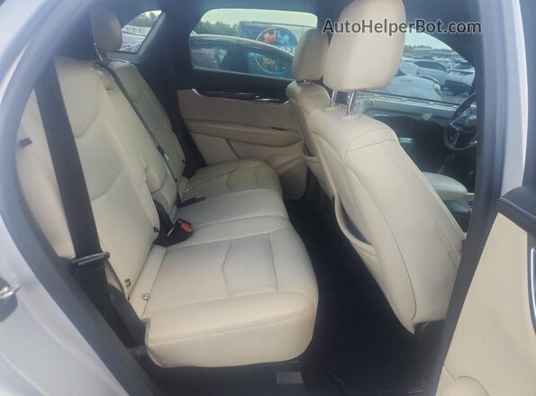 1GYKNARS5KZ183554 2019 CADILLAC XT5 Silver Rear interior view