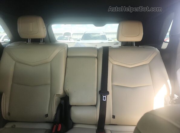 1GYKNARS5KZ183554 2019 CADILLAC XT5 Silver Rear seats view