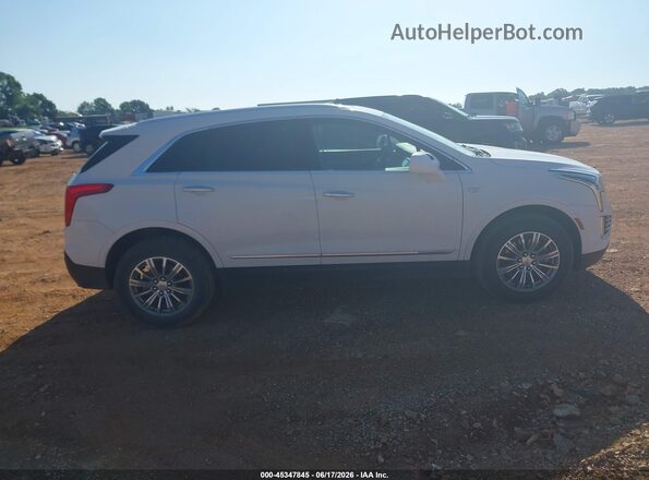 1GYKNCRS0KZ284982 2019 CADILLAC XT5 White Vista interior trasera