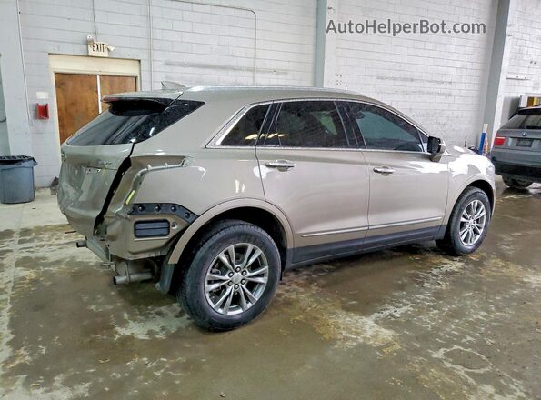 1GYKNDR41PZ163845 2023 CADILLAC XT5 Желто-коричневый Задняя правая четверть