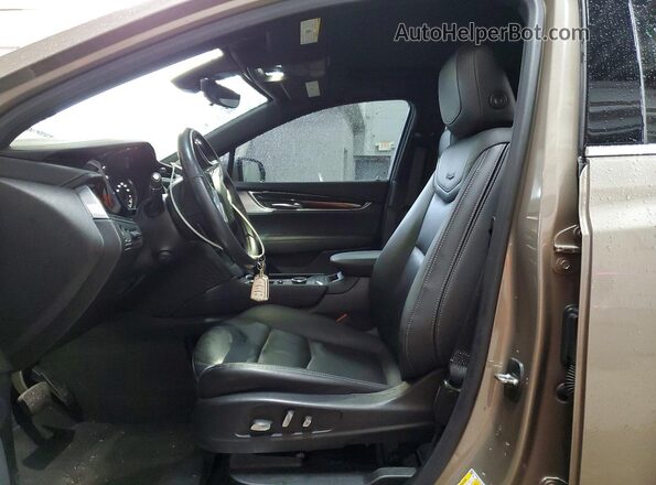 1GYKNDR41PZ163845 2023 CADILLAC XT5 Желто-коричневый Вид салона спереди