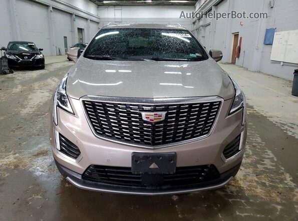 1GYKNDR41PZ163845 2023 CADILLAC XT5 Желто-коричневый Вид спереди