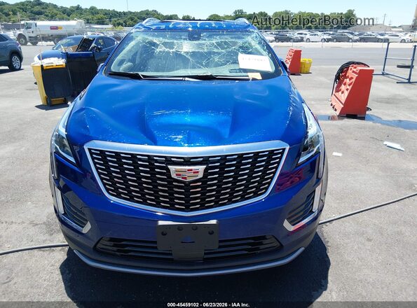1GYKNDR43RZ748994 2024 CADILLAC XT5 Blue Սարքավորումների վահանակի տեսք