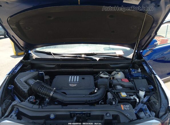 1GYKNDR43RZ748994 2024 CADILLAC XT5 Blue Հետևի տեսք