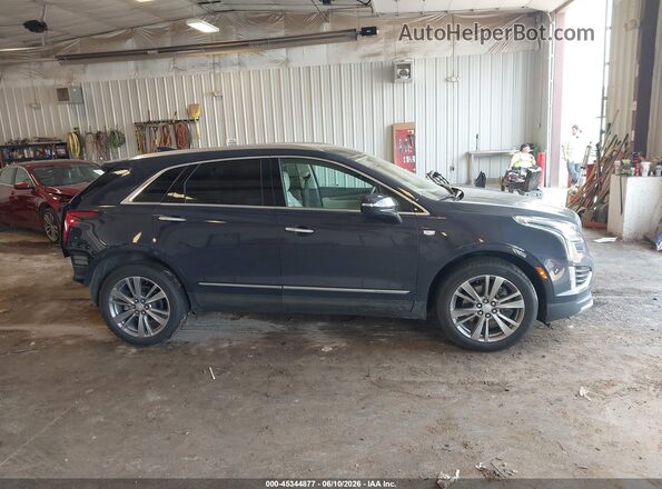 1GYKNDR48RZ725615 2024 CADILLAC XT5 Dark Blue Вид задней части салона