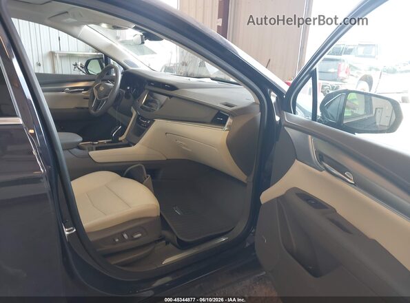 1GYKNDR48RZ725615 2024 CADILLAC XT5 Dark Blue Вид салона спереди