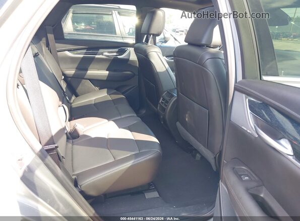 1GYKNDR49PZ107930 2023 CADILLAC XT5 Gray Vista de la etiqueta del VIN