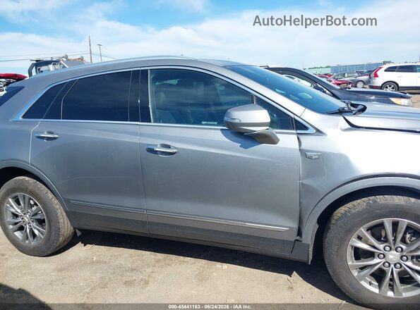 1GYKNDR49PZ107930 2023 CADILLAC XT5 Gray Vista interior trasera