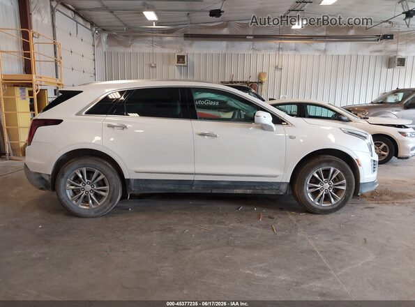 1GYKNDR4XPZ191983 2023 CADILLAC XT5 White Вид задньої частини салону
