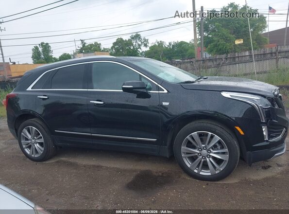 1GYKNDRS0RZ720746 2024 CADILLAC XT5 Black Սալոնի հետևի տեսք