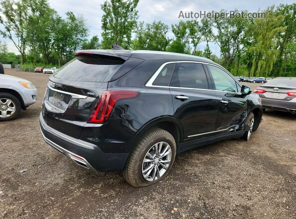 1GYKNDRS1LZ236334 2020 CADILLAC XT5 Black Trasero derecho