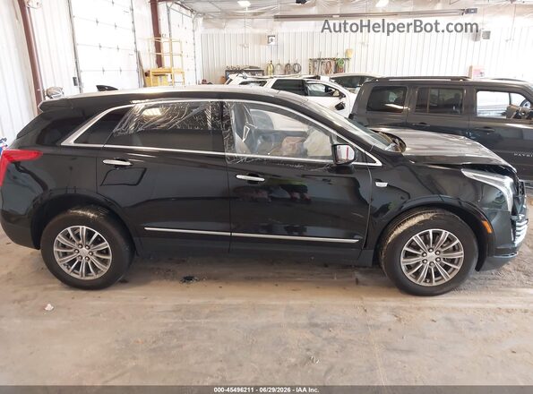 1GYKNDRS6KZ249336 2019 CADILLAC XT5 Black Սալոնի հետևի տեսք