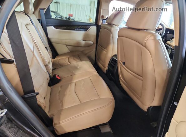 1GYKNFRSXHZ141189 2017 CADILLAC XT5 Black Vista interior trasera