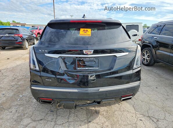 1GYKNGRS9PZ119348 2023 CADILLAC XT5 Black Widok z tyłu