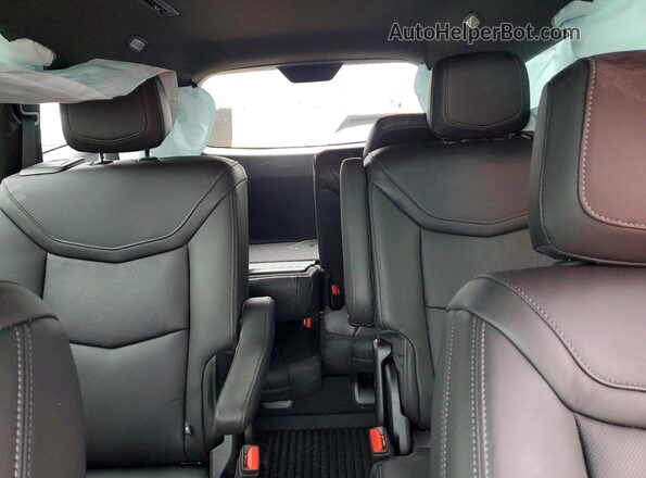 1GYKPDRS4SZ158205 2025 CADILLAC XT6 White Vista de los asientos traseros