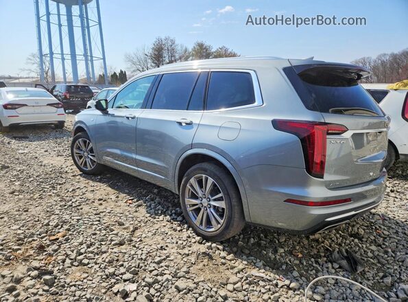 1GYKPDRS6PZ185719 2023 CADILLAC XT6 Silver Trasero izquierdo