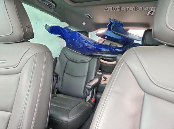 1GYKPDRS9SZ119433 2025 CADILLAC XT6 Blue Vista de los asientos traseros
