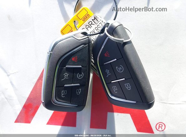 1GYKPRRK8SZ312590 2025 CADILLAC OTHER Red Առջևի վահանակի տեսք