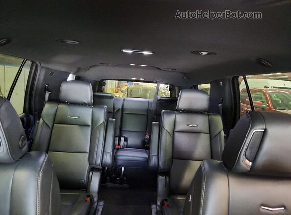 1GYS4AKL5PR100508 2023 CADILLAC ESCALADE Black Rear seats view