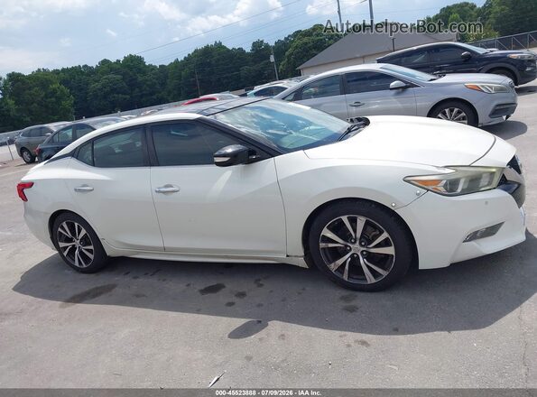 1N4AA6AP0HC377525 2017 NISSAN MAXIMA White Widok wnętrza z tyłu