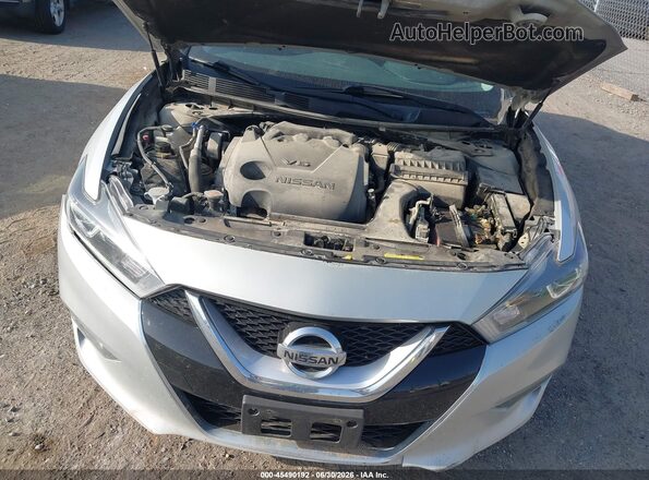 1N4AA6AP3GC398271 2016 NISSAN MAXIMA Серебряный Вид сзади