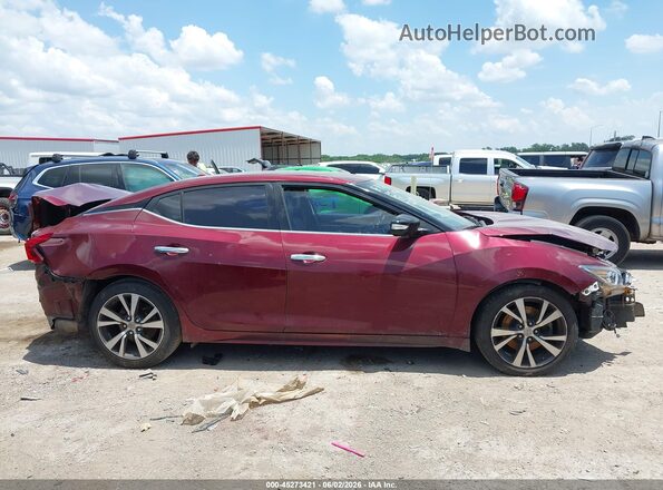 1N4AA6AP4HC396384 2017 NISSAN MAXIMA Maroon Вид задньої частини салону