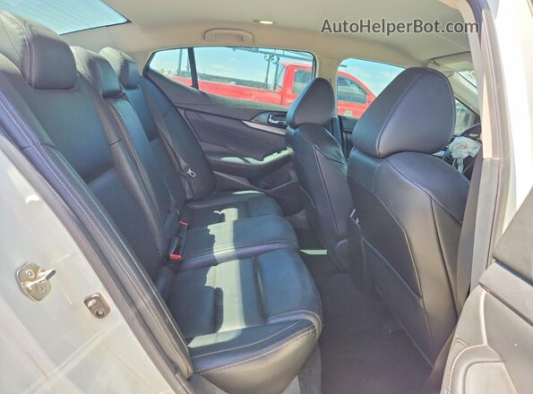 1N4AA6AP6JC399339 2018 NISSAN MAXIMA White Rear seats view