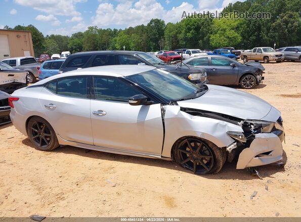1N4AA6AP7HC404056 2017 NISSAN MAXIMA Серебряный Вид задней части салона