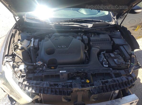 1N4AA6AP7JC385403 2018 NISSAN MAXIMA Gray Rear interior view
