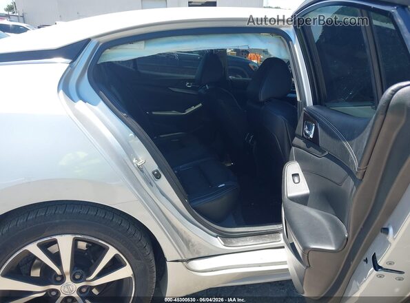 1N4AA6AP7JC390858 2018 NISSAN MAXIMA Silver VIN კოდის სტიკერის ხედი