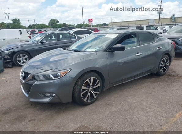 1N4AA6AP9JC391042 2018 NISSAN MAXIMA Серый Передняя левая четверть