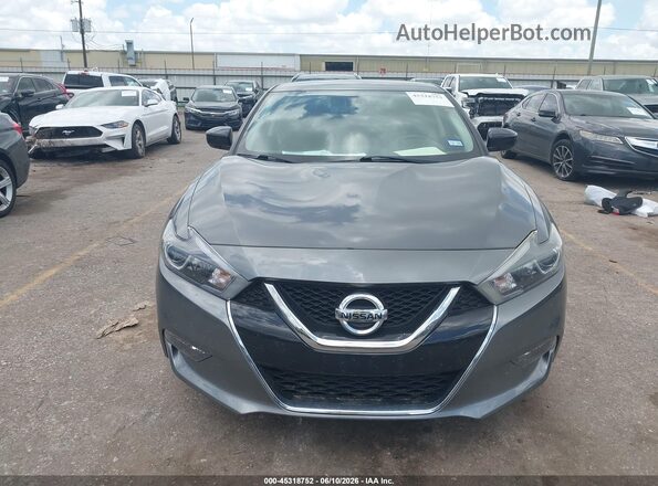 1N4AA6AP9JC391042 2018 NISSAN MAXIMA Серый Вид панели приборов