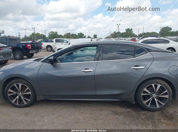 1N4AA6AP9JC391042 2018 NISSAN MAXIMA Серый Вид задней части салона