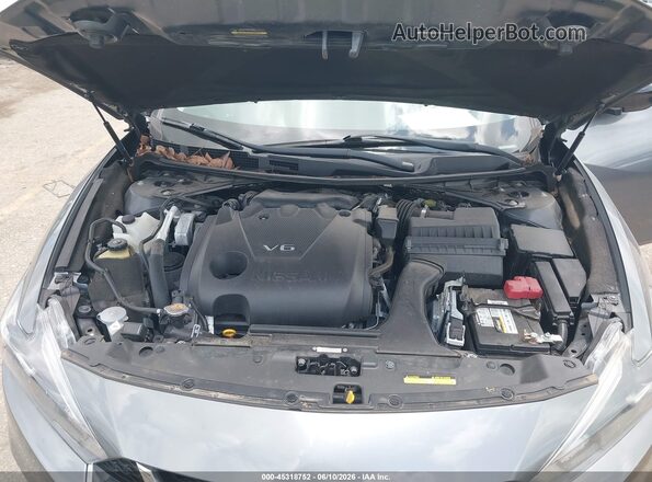1N4AA6AP9JC391042 2018 NISSAN MAXIMA Серый Вид сзади