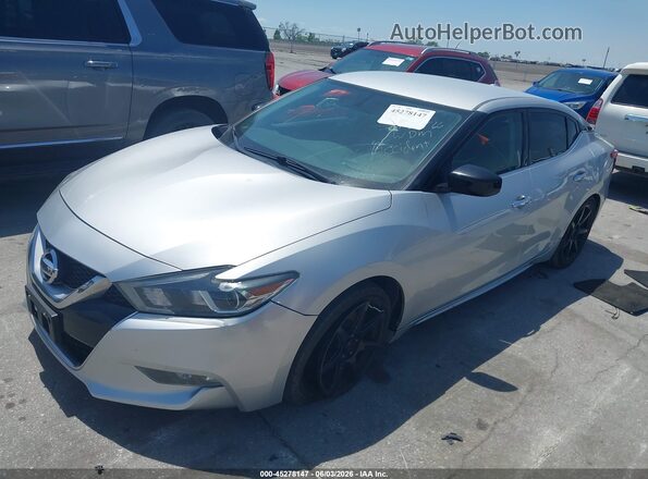 1N4AA6APXGC382942 2016 NISSAN MAXIMA Silver Vista tres cuartos delantera izquierda