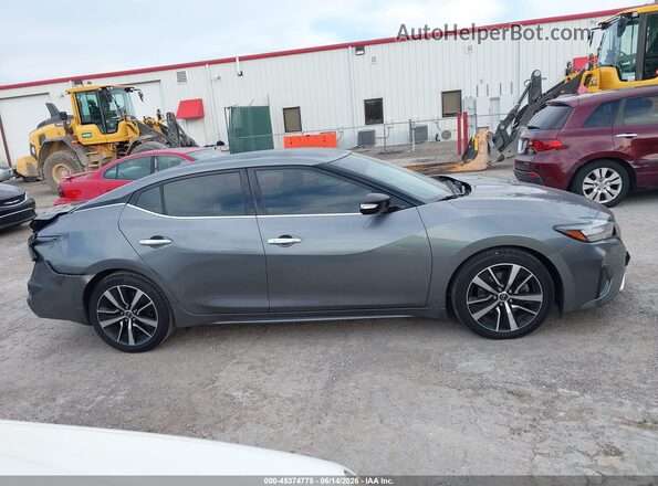 1N4AA6CV0PC502744 2023 NISSAN MAXIMA Gray Widok wnętrza z tyłu