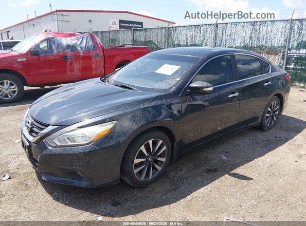 1N4AL3AP1GC218228 2016 NISSAN ALTIMA Black Vista tres cuartos delantera izquierda