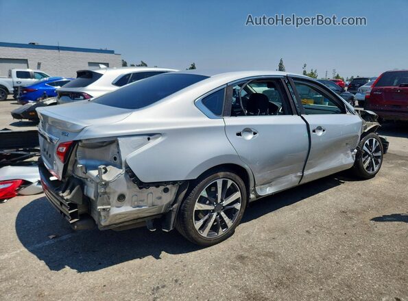 1N4AL3AP1GN377609 2016 NISSAN ALTIMA Silver Trasero derecho
