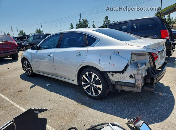 1N4AL3AP1GN377609 2016 NISSAN ALTIMA Silver Trasero izquierdo