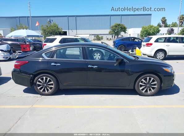 1N4AL3AP1JC211819 2018 NISSAN ALTIMA Черный Вид задней части салона