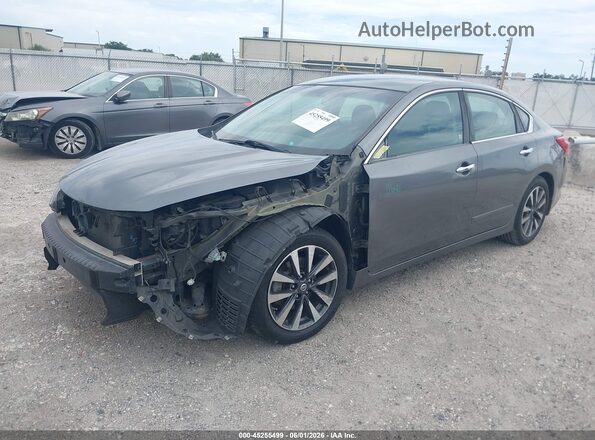 1N4AL3AP3HC219575 2017 NISSAN ALTIMA Silver Vista tres cuartos delantera izquierda