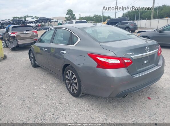 1N4AL3AP3HC219575 2017 NISSAN ALTIMA Silver Trasero izquierdo