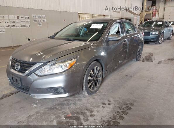 1N4AL3AP3JC215306 2018 NISSAN ALTIMA Gray Vista tres cuartos delantera izquierda