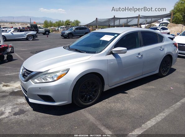 1N4AL3AP4GN326458 2016 NISSAN ALTIMA Silver Vista tres cuartos delantera izquierda